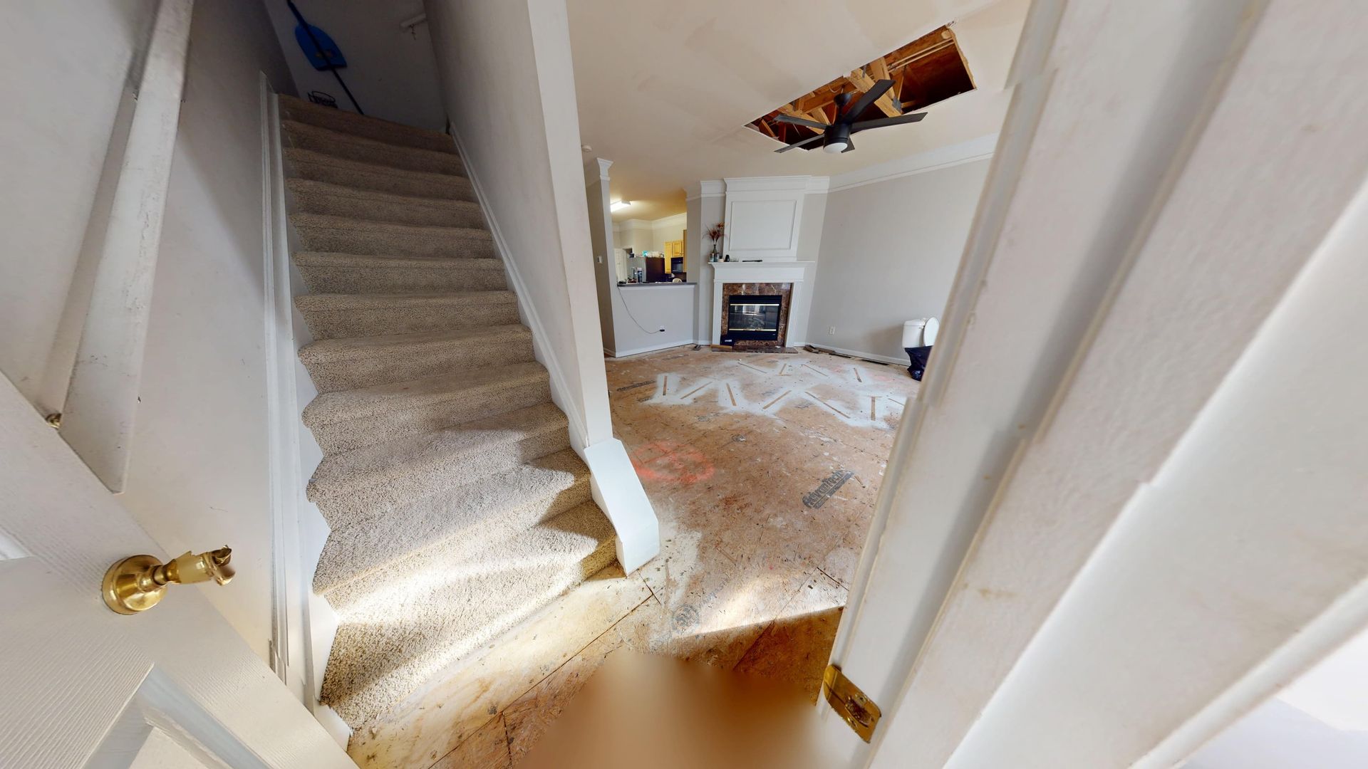 Flooded staircase landing before restoration in Mableton GA
