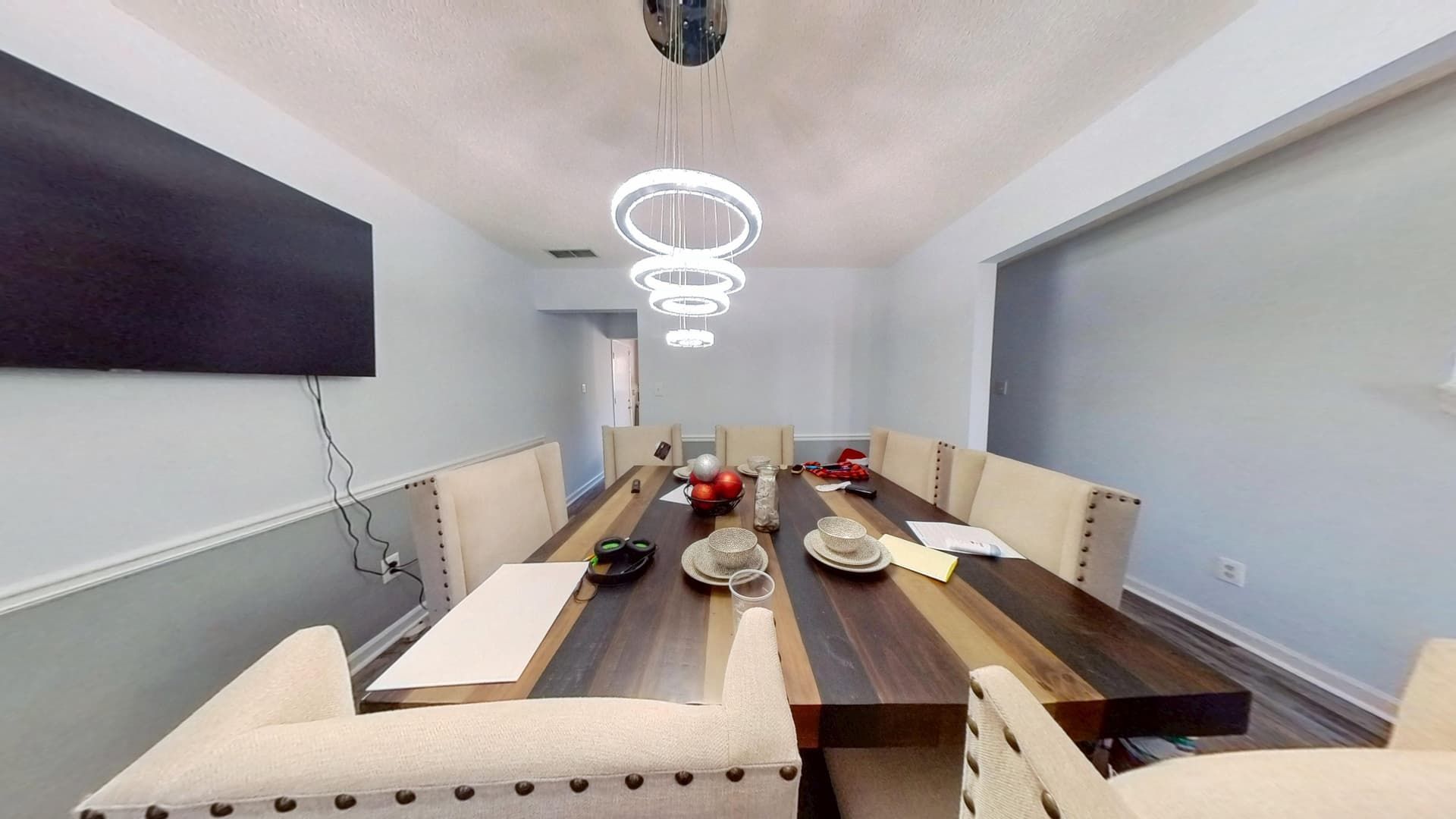 Restored dining room with repaired ceiling and fresh paint