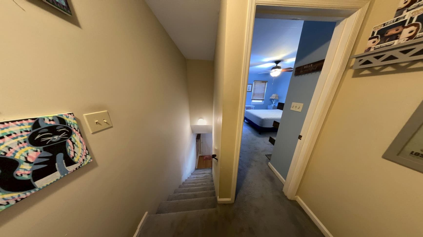 Repaired hallway ceiling and walls after water damage restoration