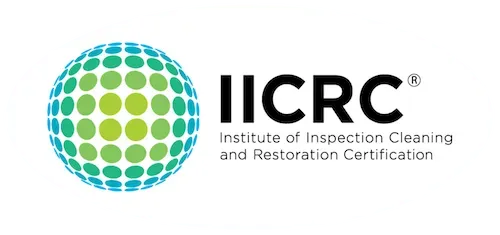 Logo for the Institute of Inspection Cleaning and Restoration Certification (IICRC). It includes a sphere of blue and green dots next to the text 