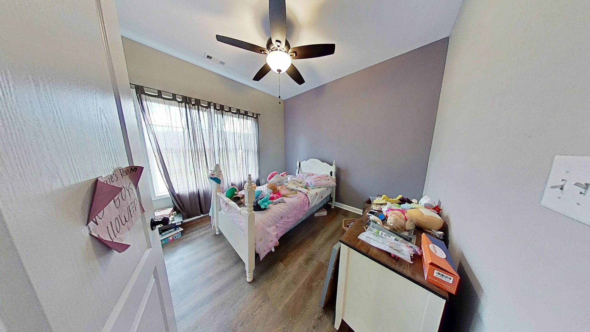 Kids room after water damage restoration with new flooring