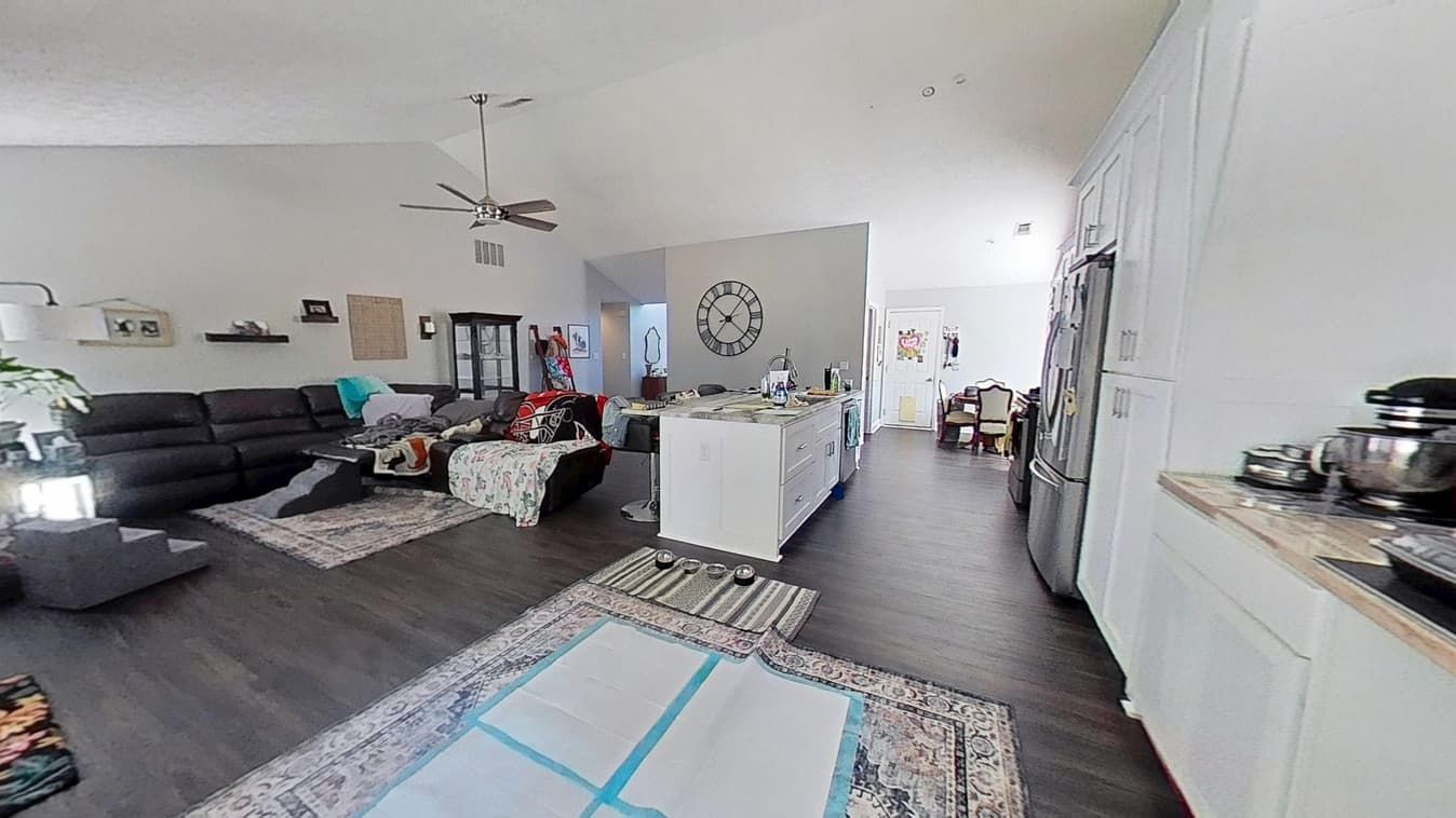 Kitchen and living room after water damage restoration in Buford