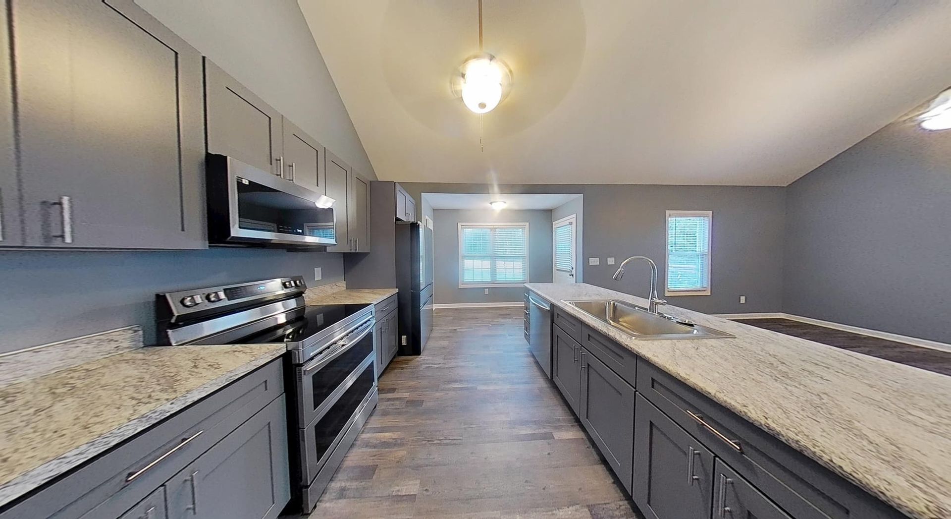 Completed kitchen rebuild after fire damage with new finishes and fixtures