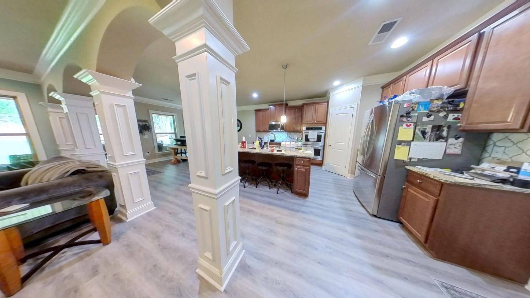 Restored dry kitchen with new flooring after flood cleanup by The Homestar Group