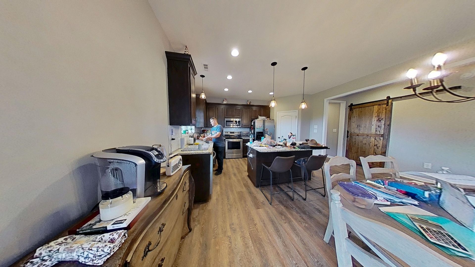 Kitchen after water damage restoration with new flooring installed