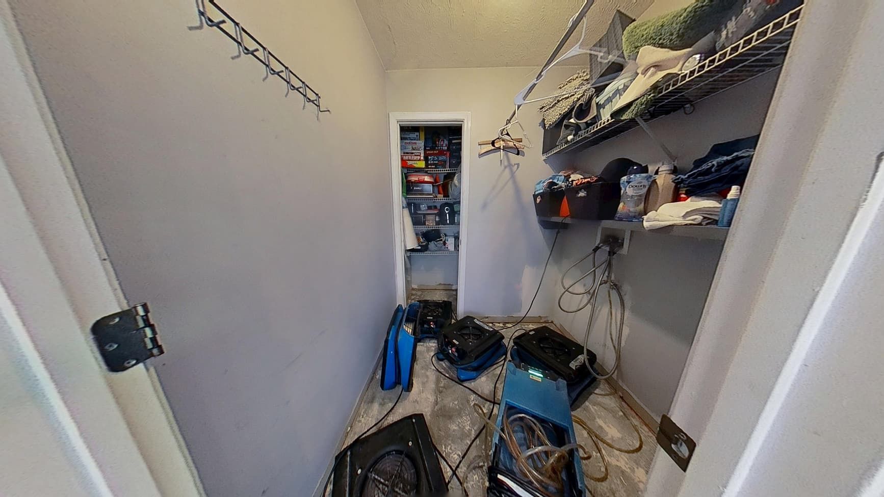Laundry room before flood cleanup in Buford
