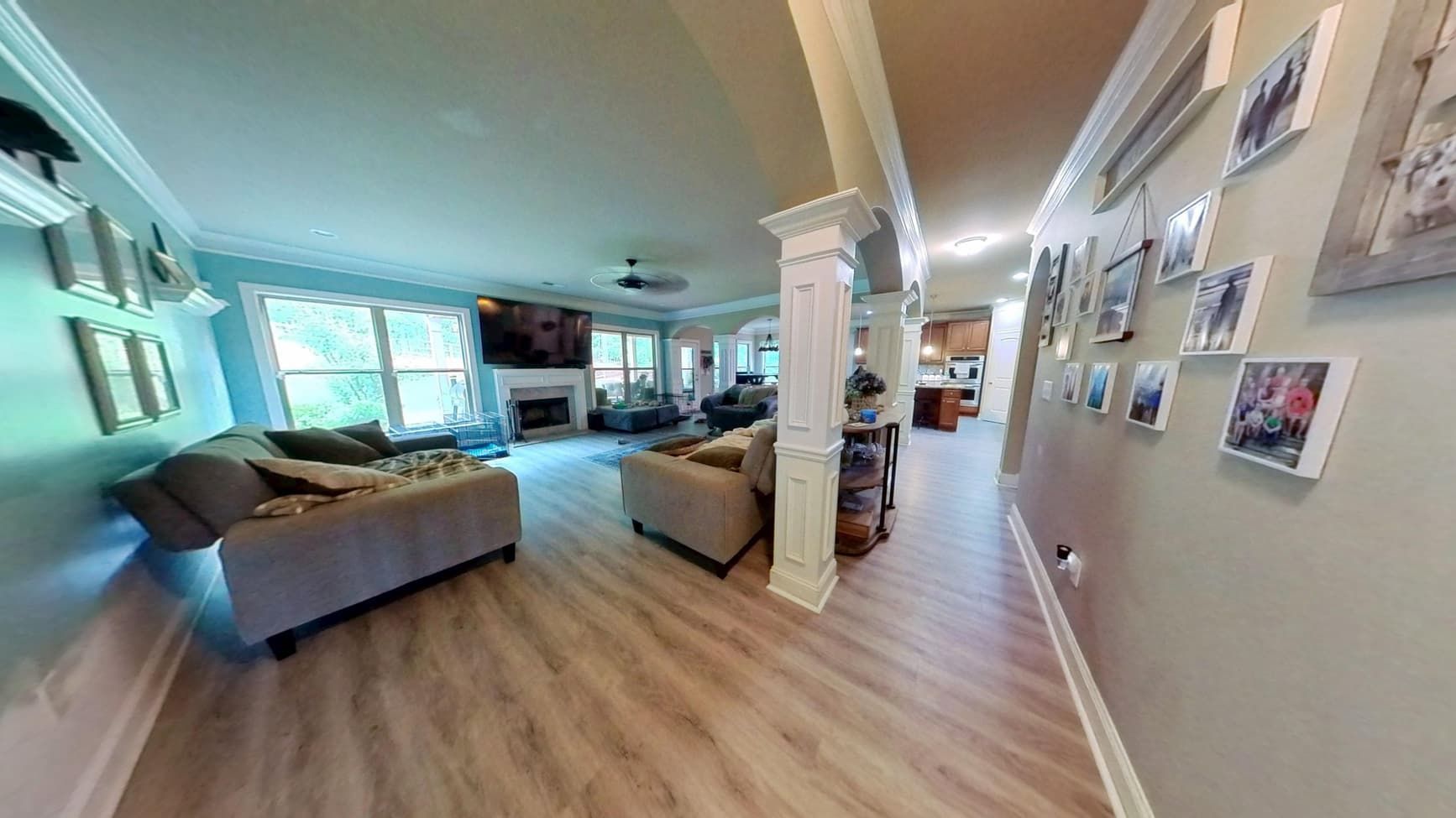 Dried and restored living room with new flooring after flood mitigation