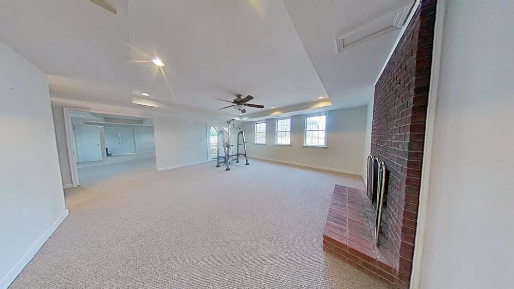 Living room after water damage restoration showing completed cleanup in Alpharetta