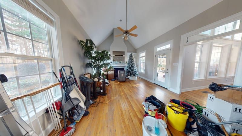 Living room showing active drying equipment
