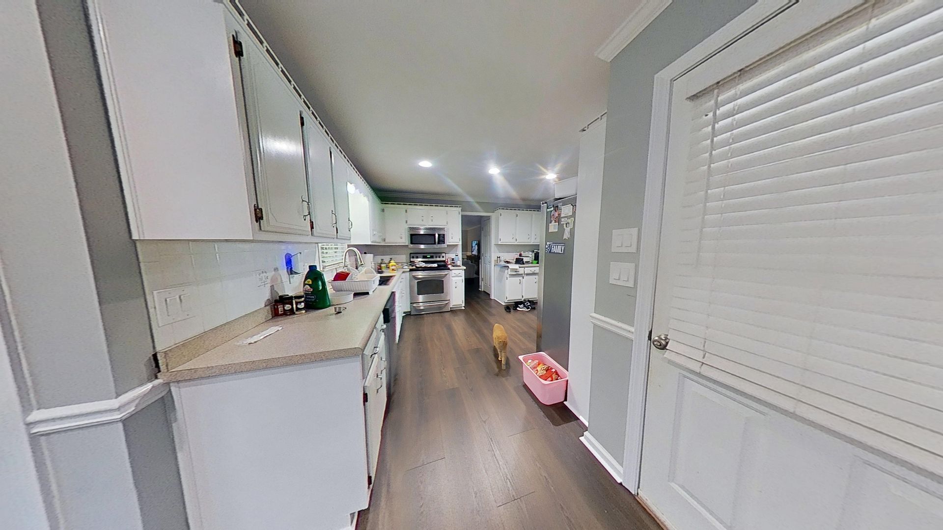 Side view of restored kitchen cabinets after water damage repair