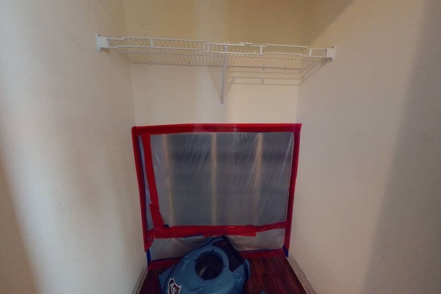 Air scrubbing equipment and containment setup during smoke damage cleanup