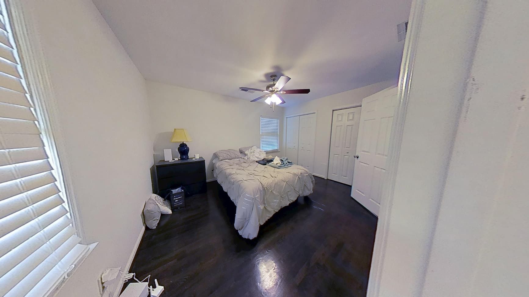 Restored bedroom with new dry flooring after water damage restoration by The Homestar Group