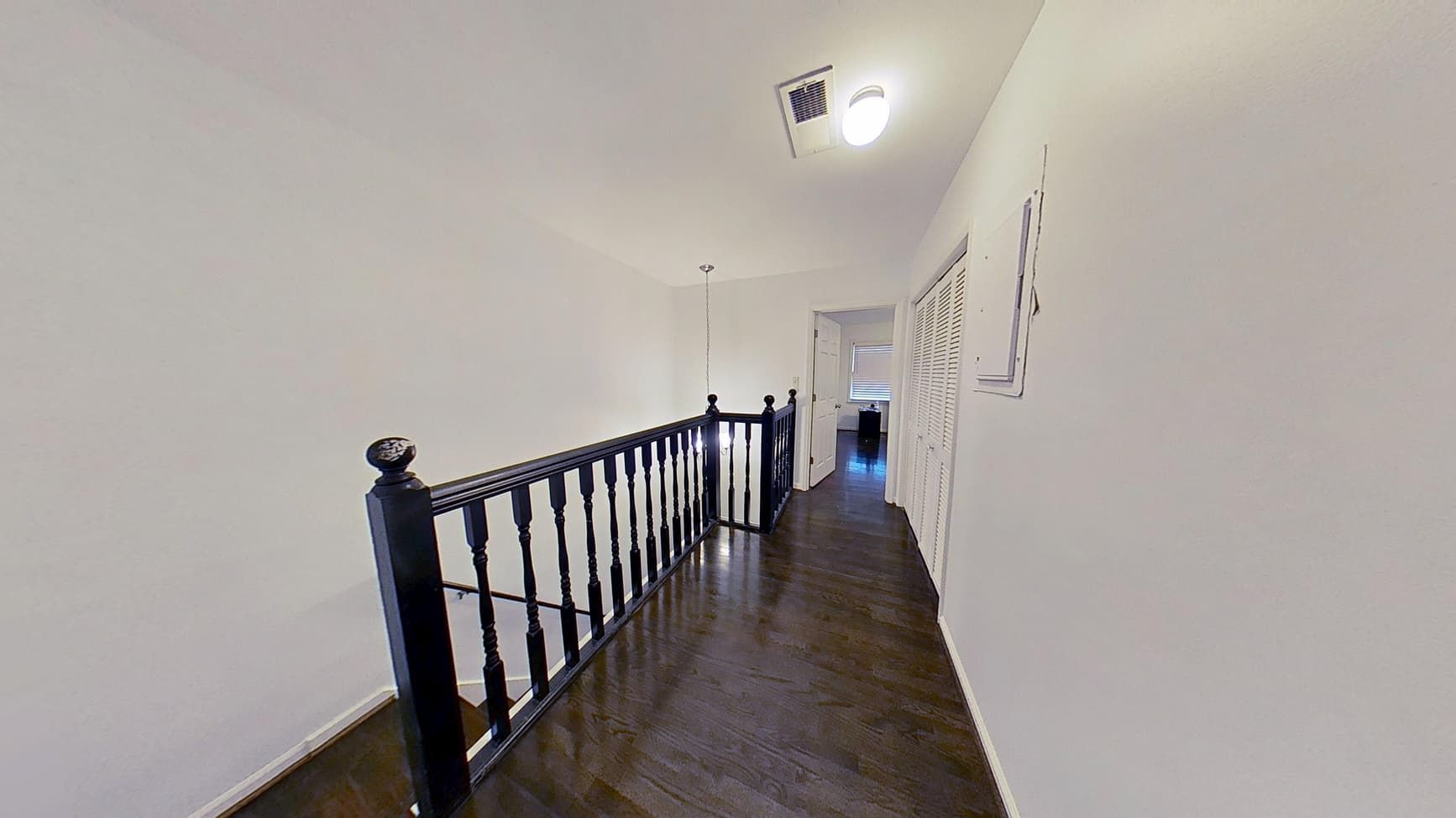 Fully restored hallway with clean dry flooring after water cleanup by The Homestar Group