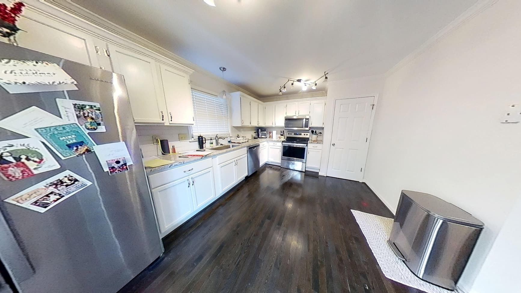 Clean restored kitchen with dry flooring after water damage restoration by The Homestar Group