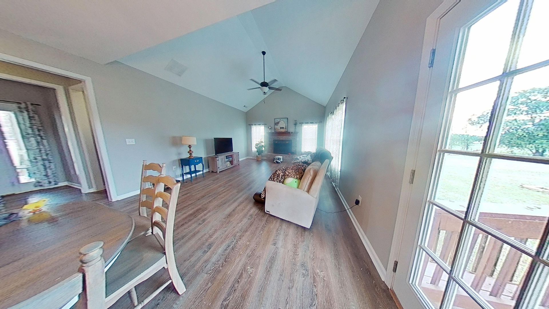 Family room after water damage restoration with new flooring
