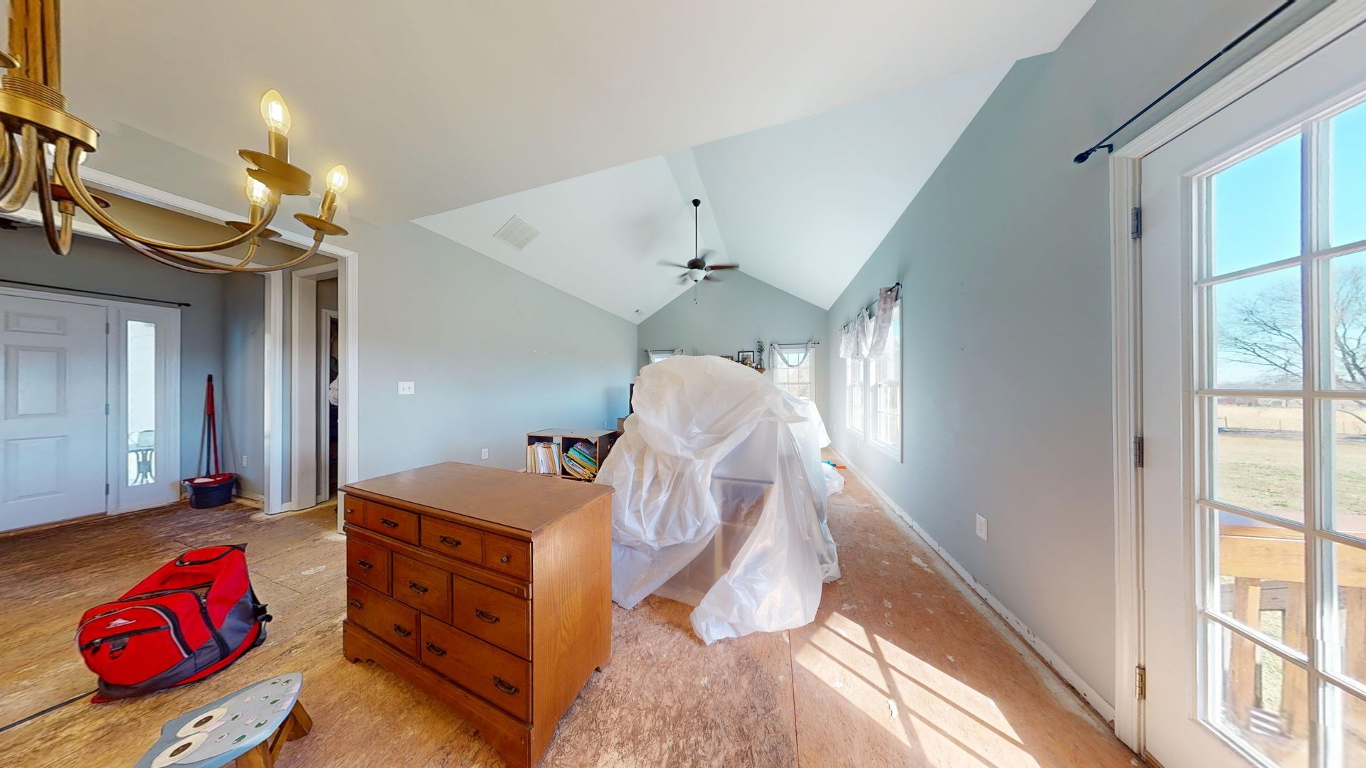 Family room before water damage restoration showing saturated carpet
