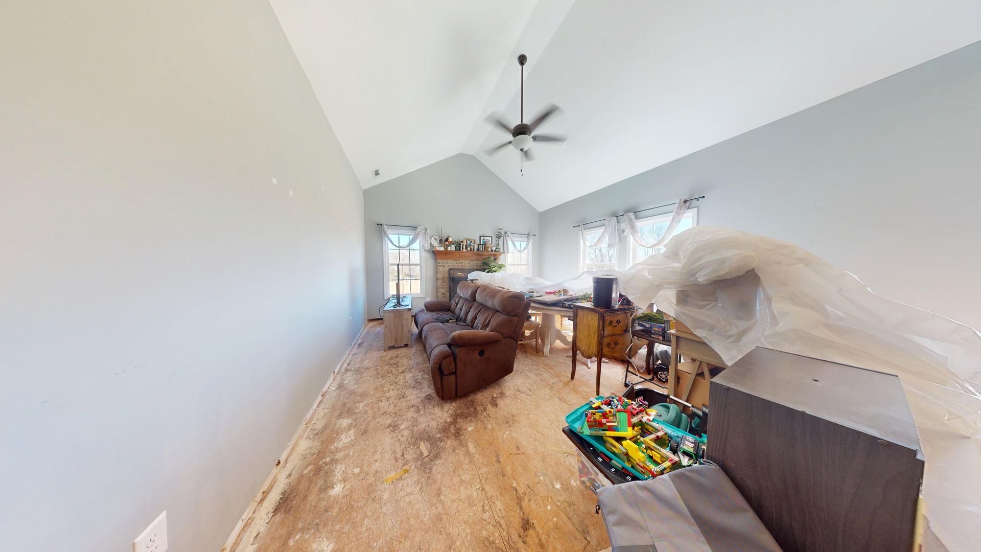 Second angle of family room before water damage restoration