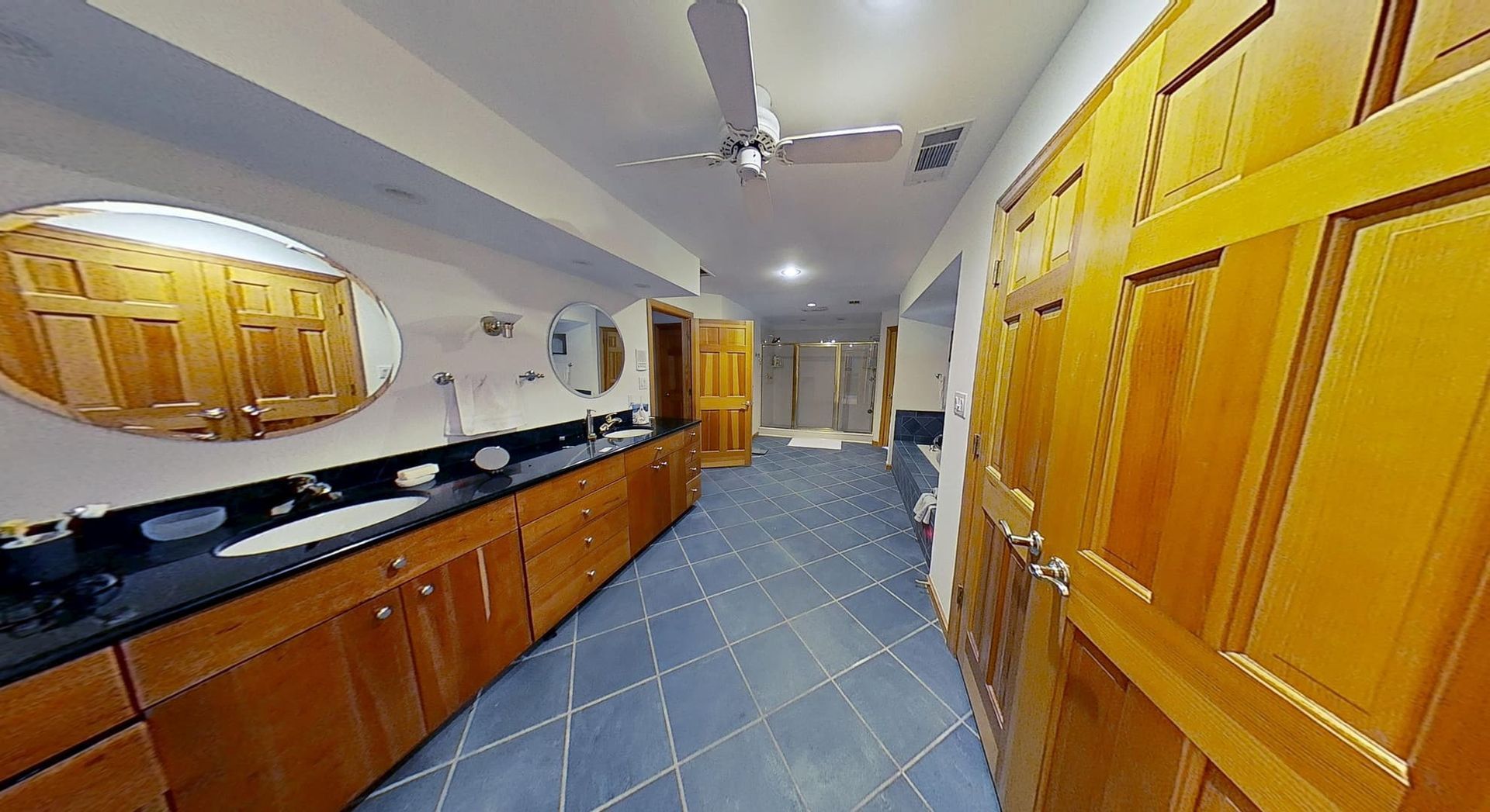 Restored bathroom ceiling after water damage cleanup in Atlanta home