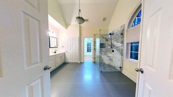 Primary bathroom restored after water damage repair