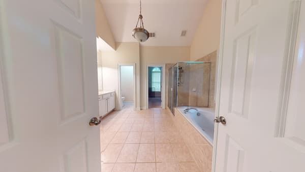 Primary bathroom with water damage before restoration