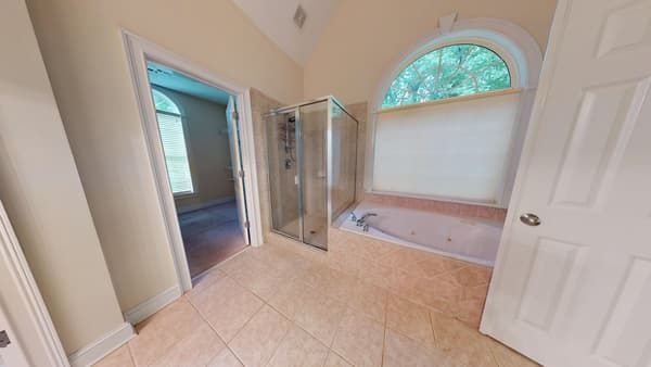 Hall bathroom with water damage before restoration