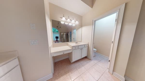 Upstairs bathroom where leak originated before restoration