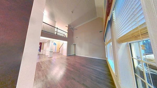 Restored bedroom with new flooring after water damage cleanup