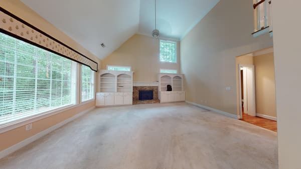 Water damaged bedroom before restoration showing affected flooring