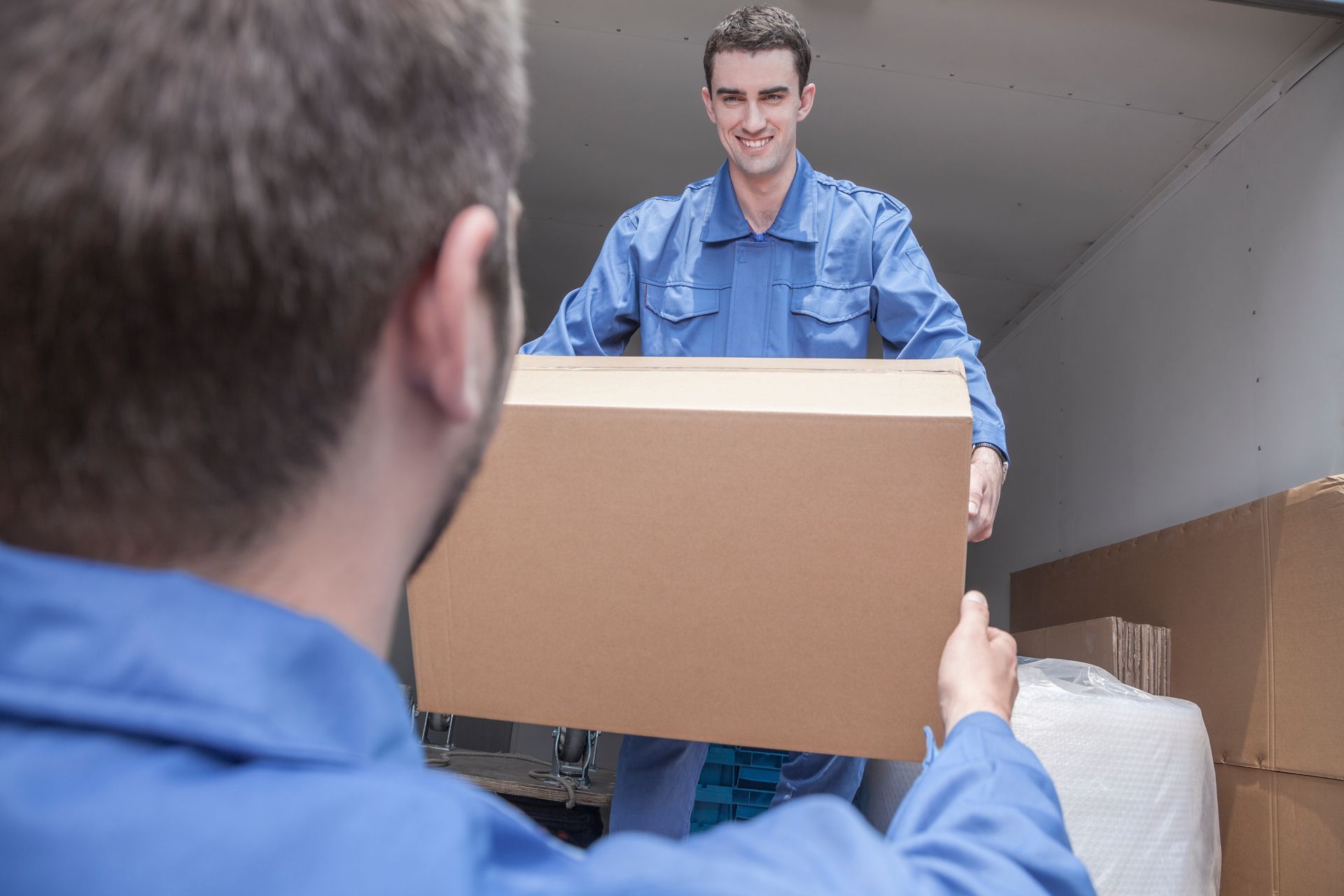 Reliable team efficiently moving furniture items.