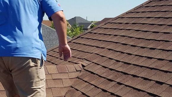 construction worker install new roofing