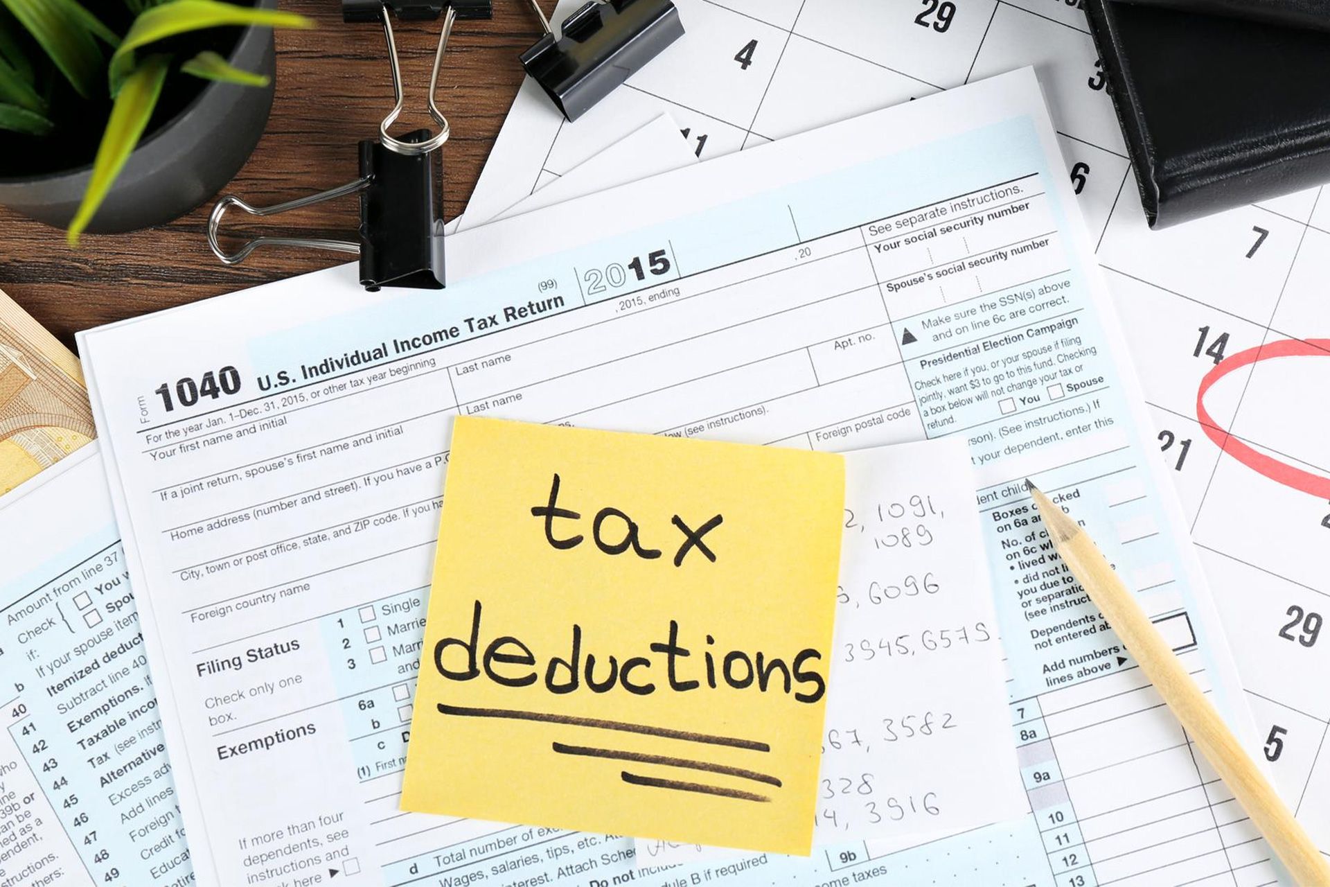 Taxpayer reviewing important income tax deductions and records