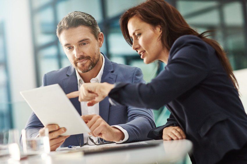 Cropped shot of two businesspeople meeting in the office