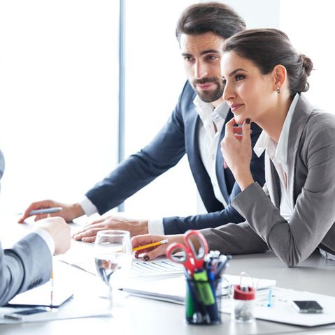 Young couple meeting with their financial advisor