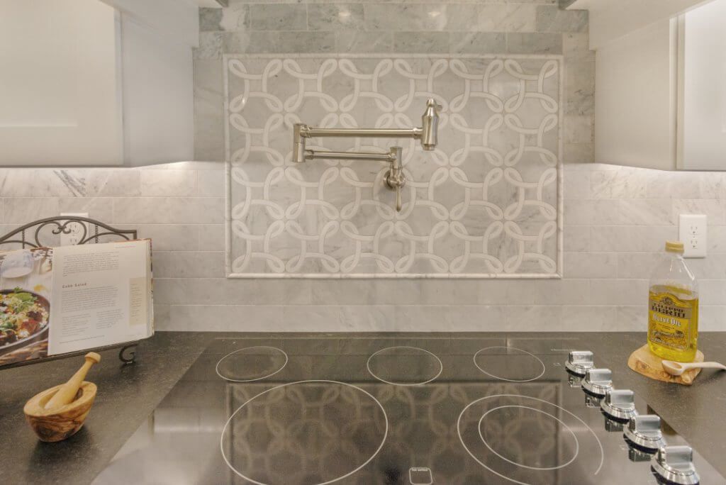 Home Additions: A kitchen with a stovetop oven.