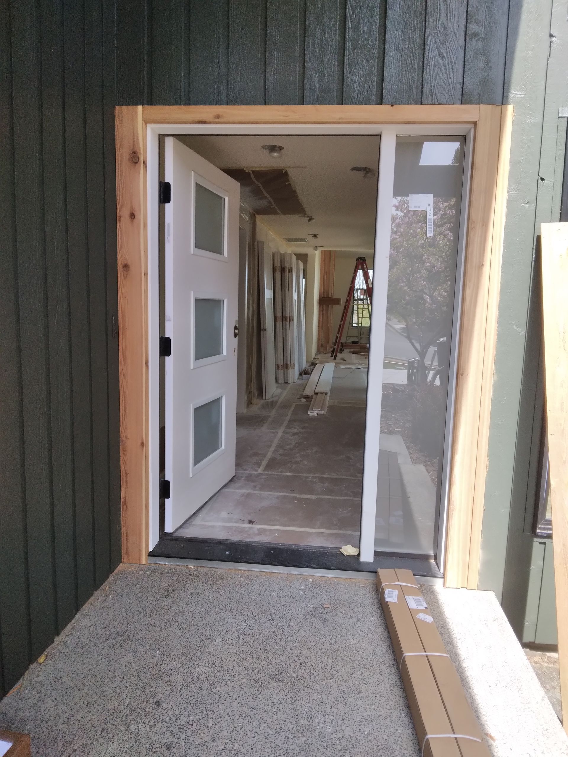 A door that is being installed in a house