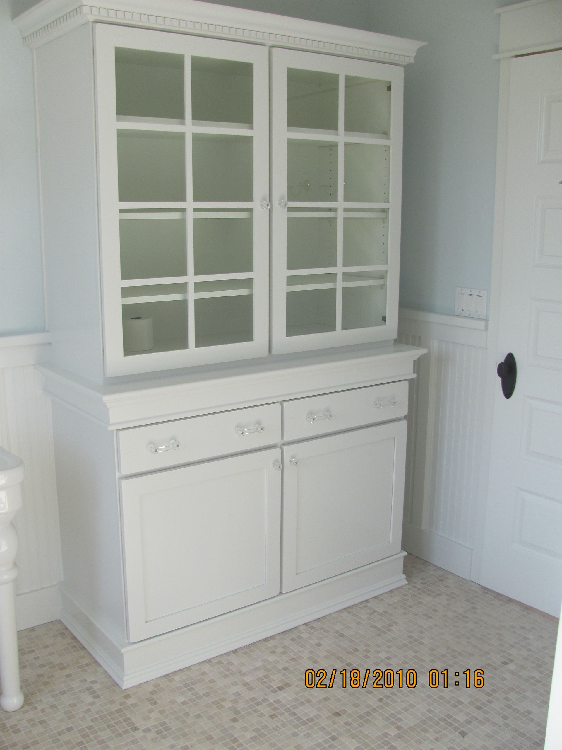A picture of a white hutch was taken on december 13th at 11:16