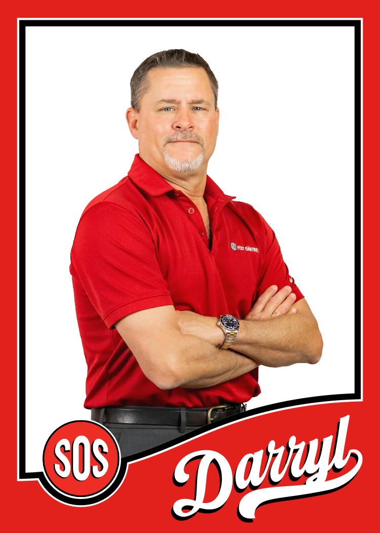 Darryl is standing with his arms crossed. He is the President of SOS