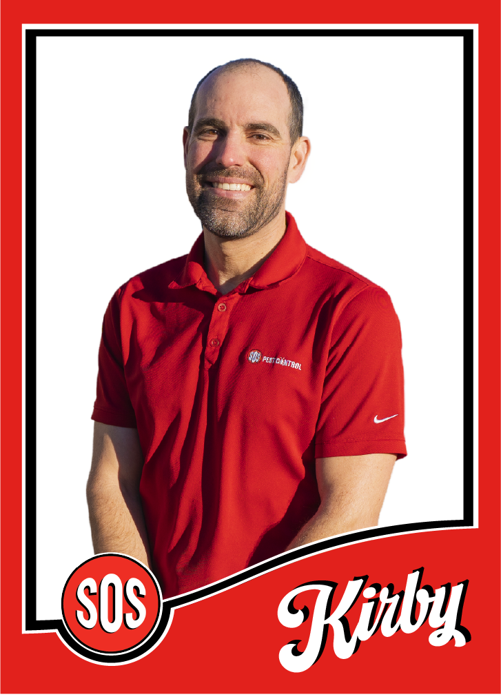 Thomas is the Account Specialist and is standing with his arms crossed.