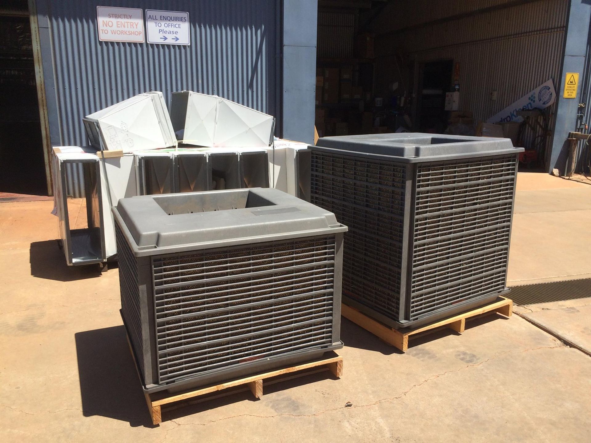 Two Industrial Cooling Units on Pallets — Cumming Airconditioning & Sheetmetal in Ryan, QLD