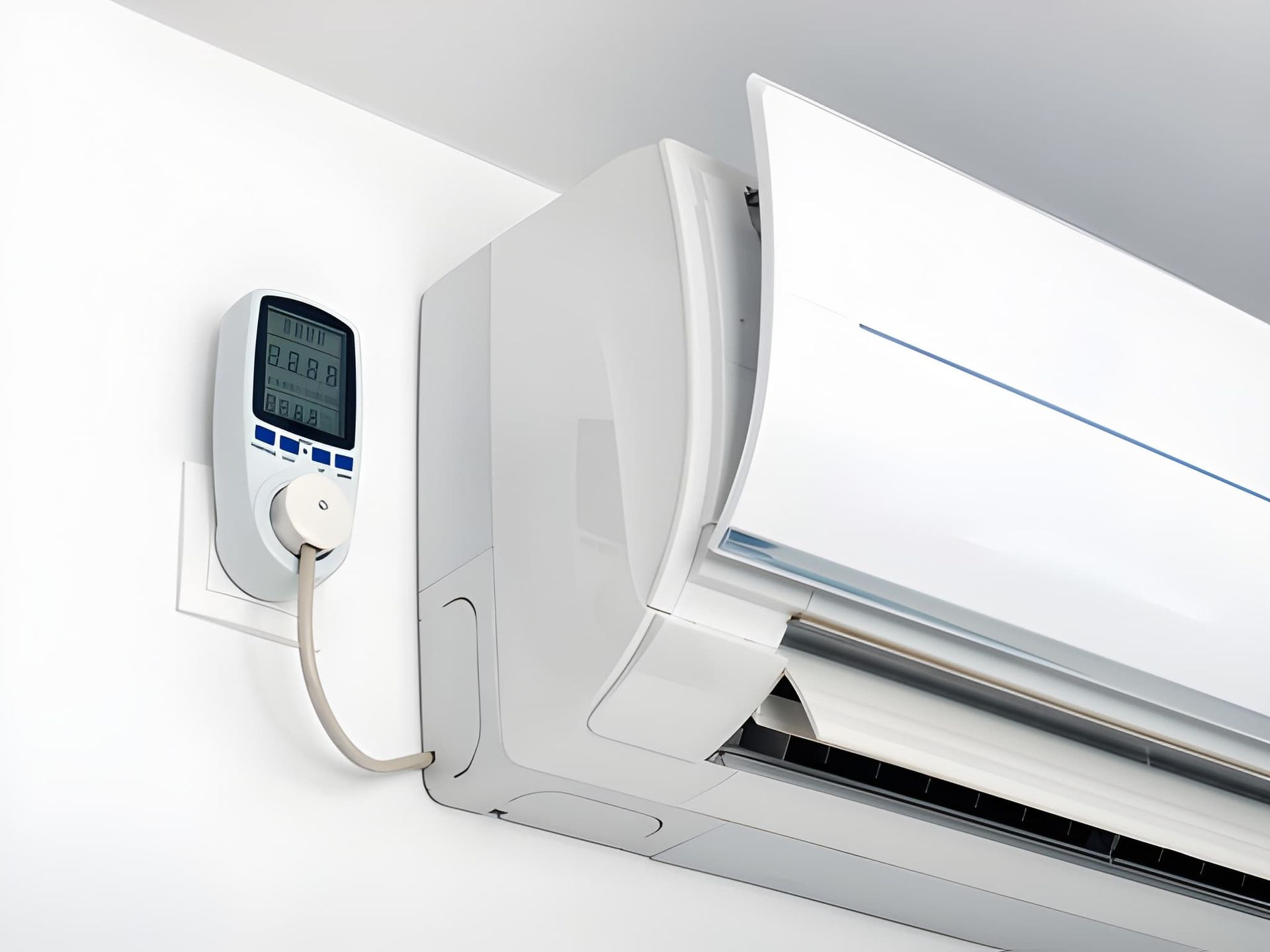 White Wall-mounted Air Conditioner Unit With Attached Digital Thermostat — Cumming Airconditioning & Sheetmetal in Ryan, QLD