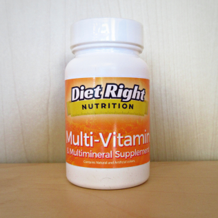 White bottle of Diet Right Nutrition multi-vitamin and multimineral supplements on a shelf.