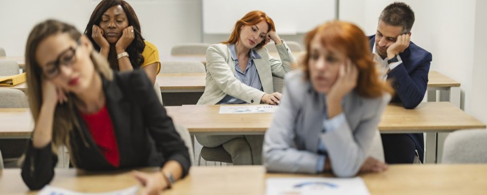 Employees disengaged during corporate training.