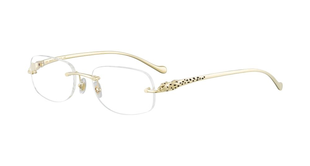A pair of glasses with a leopard print on the arm on a white background.