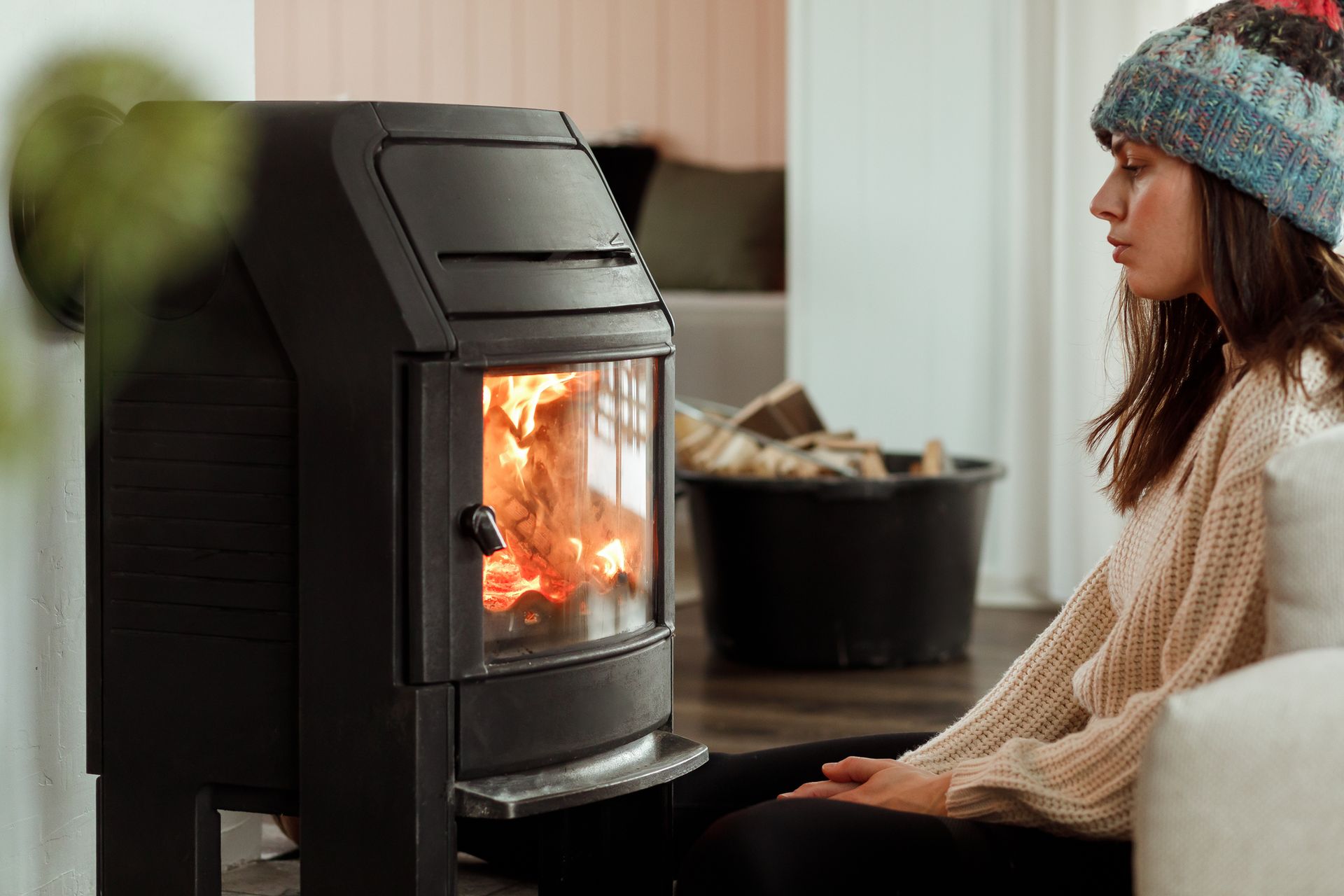 Woman in Front of Fireplace | Mack Chimney Services | Temple Hills, MD