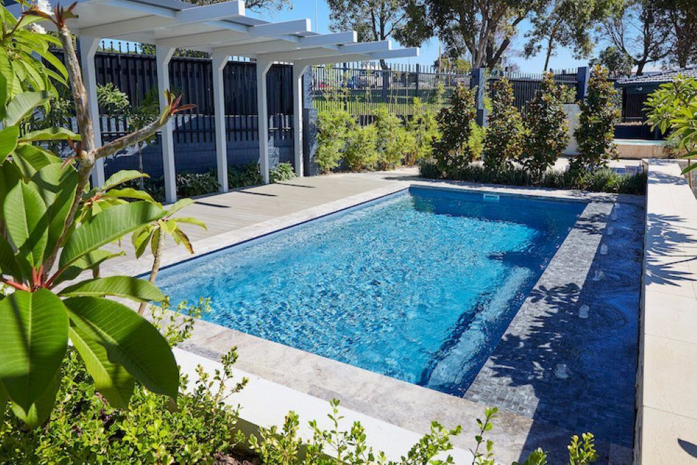 A Picture of a Medium Swimming Pool of a Billabong Pool 7.5m x 3.8m — SJ Pools and Concreting in Dubbo, NSW