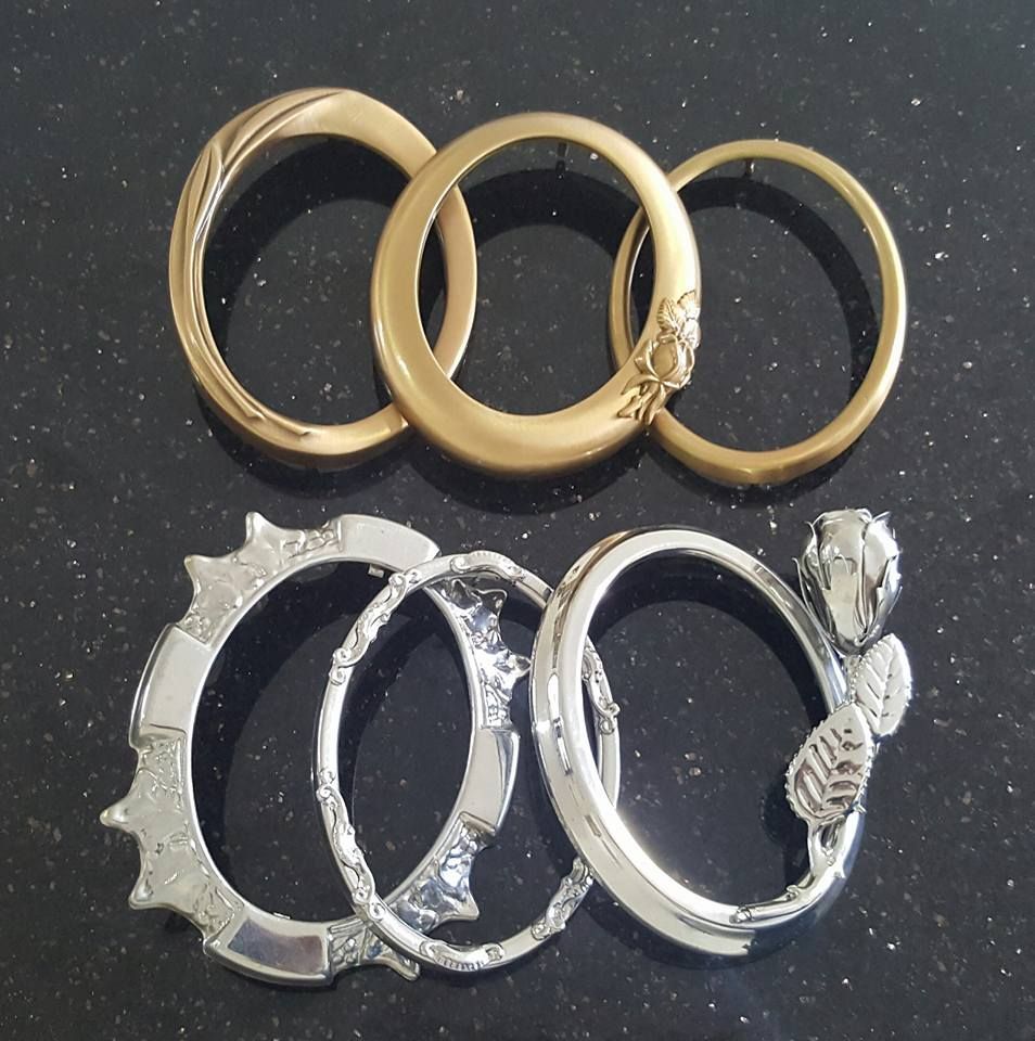Gold and Silver Rings on a Black Surface — Gori Marble & Granite Pty Ltd in Mossman, QLD