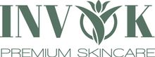 A logo for Invok skincare with a flower in the middle.