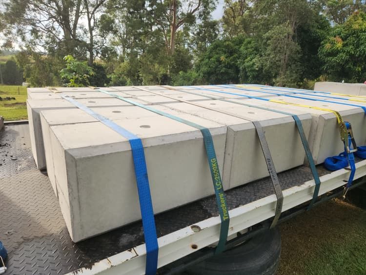 Heavy stone blocks  on a crane truck — BS Crane Truck and Trailer Hire In Long Flat, QLD