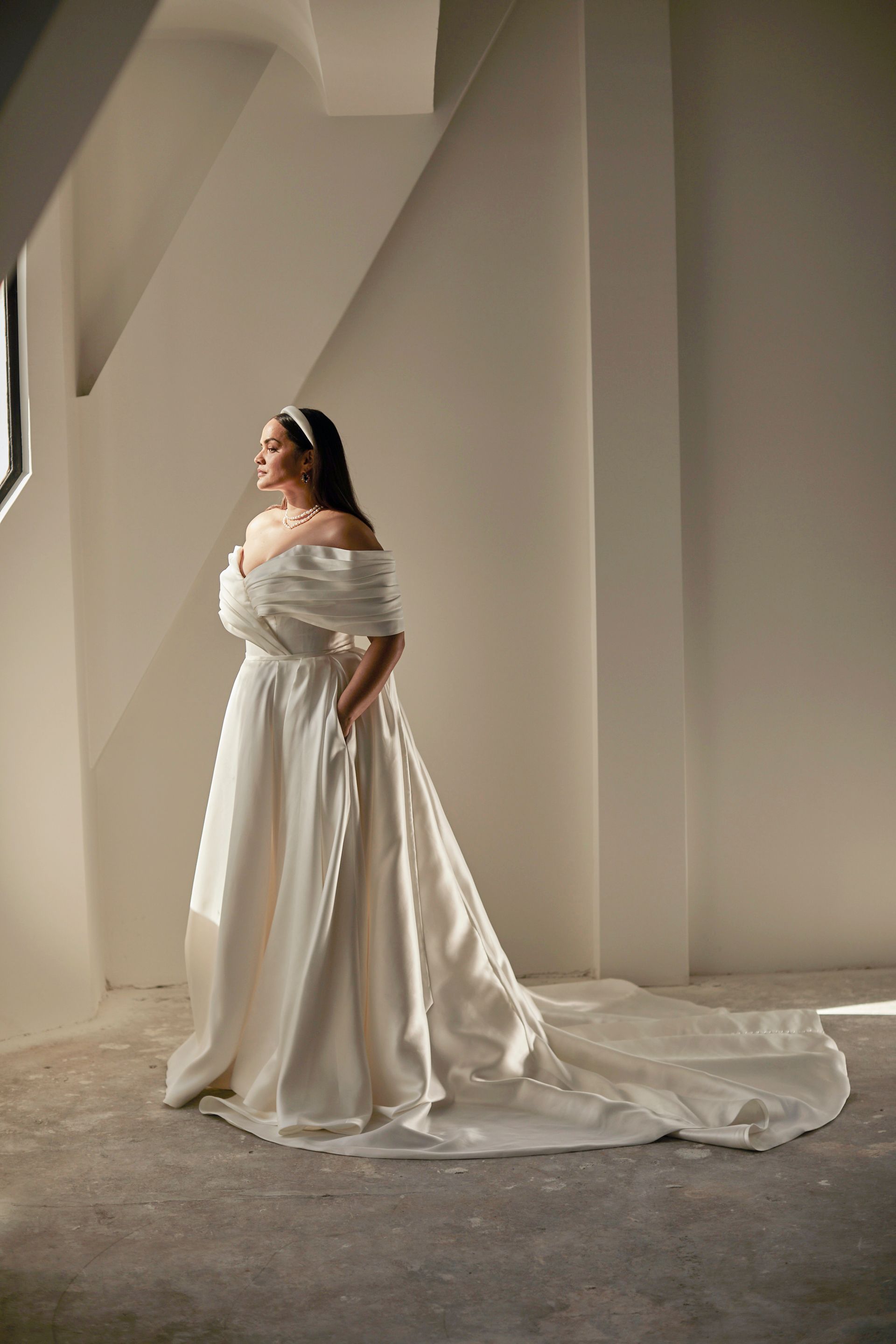 Ivory off-the-shoulder wedding gown