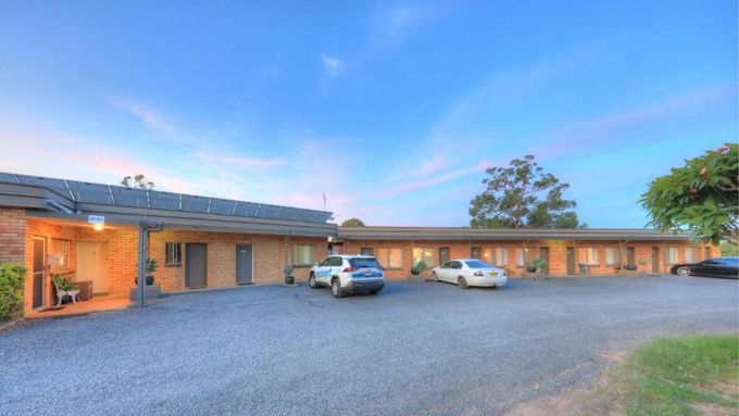 Cars Are Parked Outside The Motel — Hilldrop Motor Inn In Waterview Heights, NSW